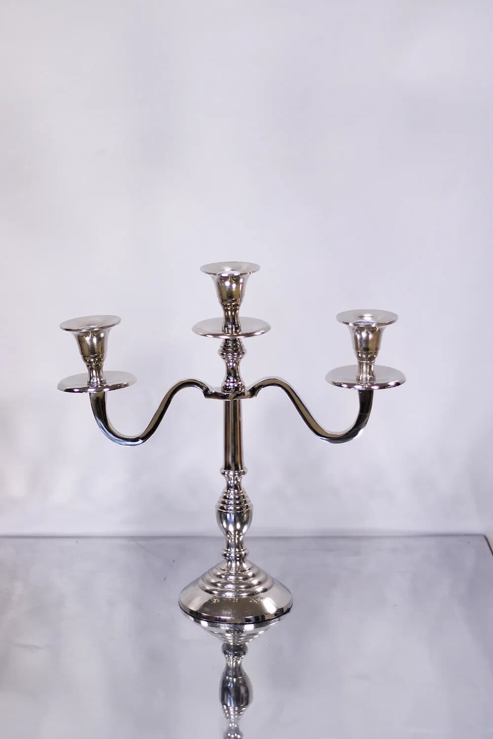 Silver three-arm candelabra, rental